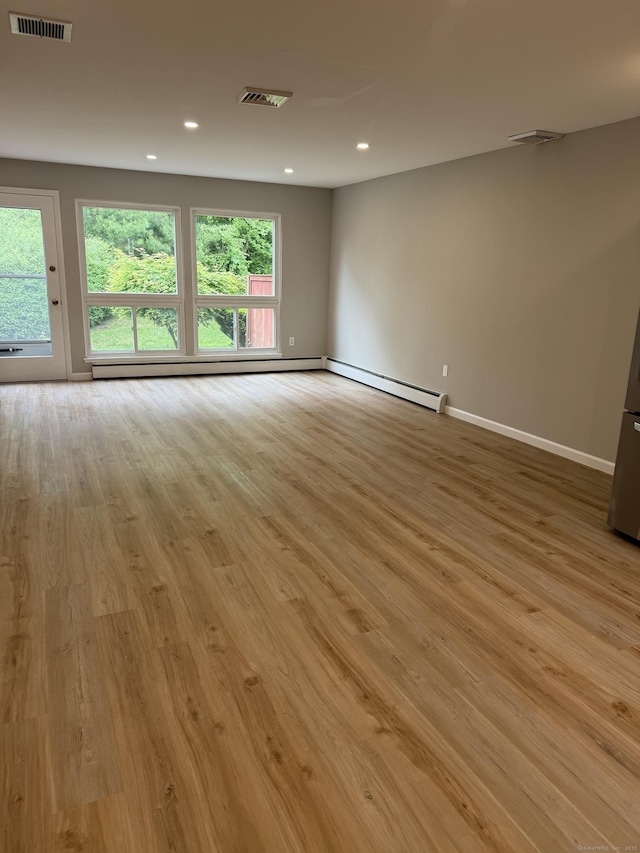 240 Centerbrook Rd Unit 240, Hamden, CT 06518 - spare room with light wood-style floors, plenty of natural light, baseboards, recessed lighting, and baseboard heating