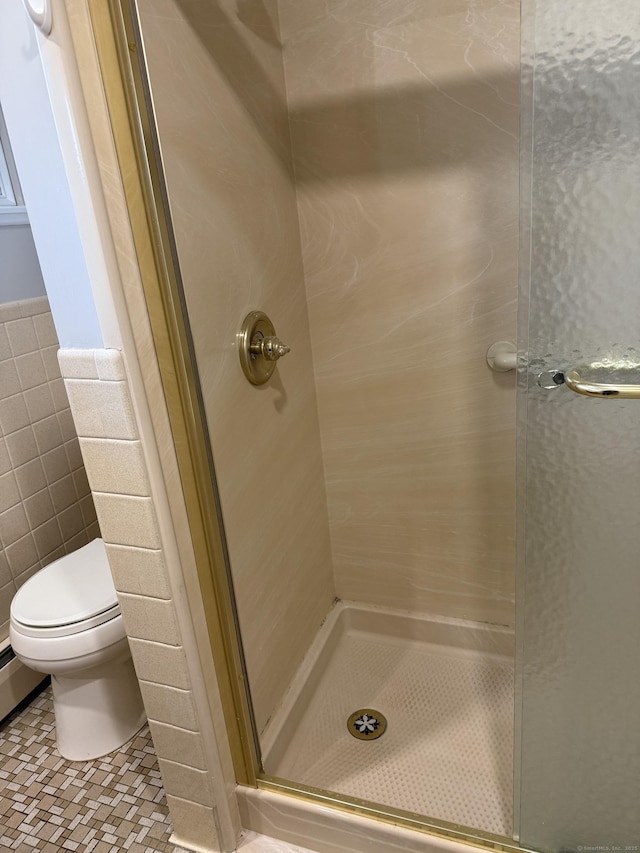 240 Centerbrook Rd Unit 240, Hamden, CT 06518 - bathroom featuring a shower stall, toilet, and tile walls