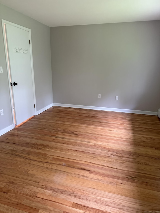 240 Centerbrook Rd Unit 240, Hamden, CT 06518 - unfurnished room featuring wood finished floors and baseboards