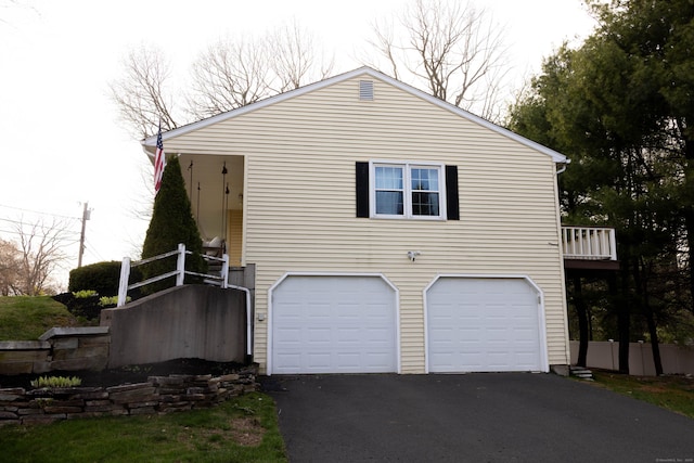 65 Lufkin Ln, Bristol, CT 06010 - view of front of home with driveway and an attached garage