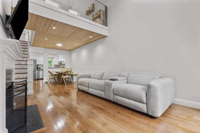 48 Twin Oaks Unit 48, New Milford, CT 06776 - living room featuring light wood-style flooring, baseboards, wooden ceiling, and recessed lighting