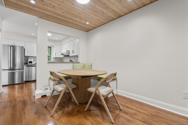 48 Twin Oaks Unit 48, New Milford, CT 06776 - dining space featuring recessed lighting, wood finished floors, wooden ceiling, and baseboards