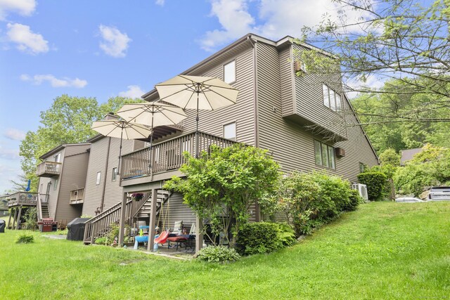 48 Twin Oaks Unit 48, New Milford, CT 06776 - back of house with a yard, a deck, and stairway