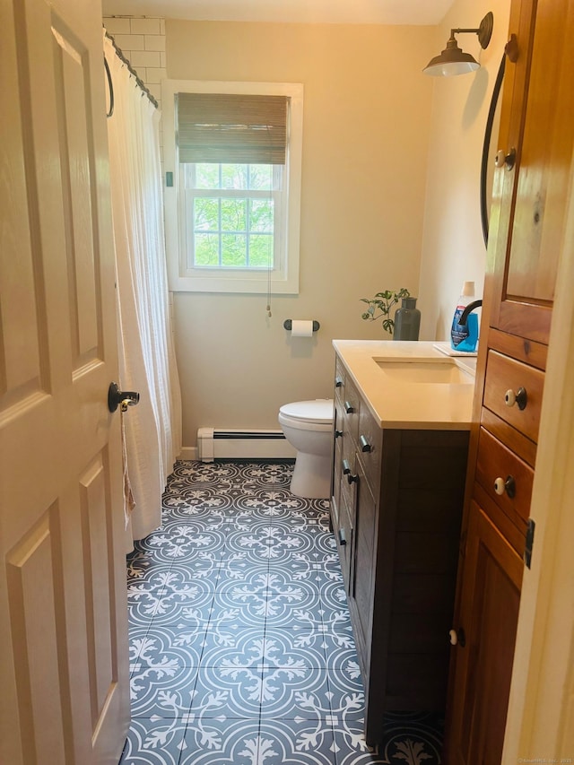 23 Dana Rd, Danbury, CT 06811 - full bath with baseboard heating, vanity, toilet, and tile patterned floors