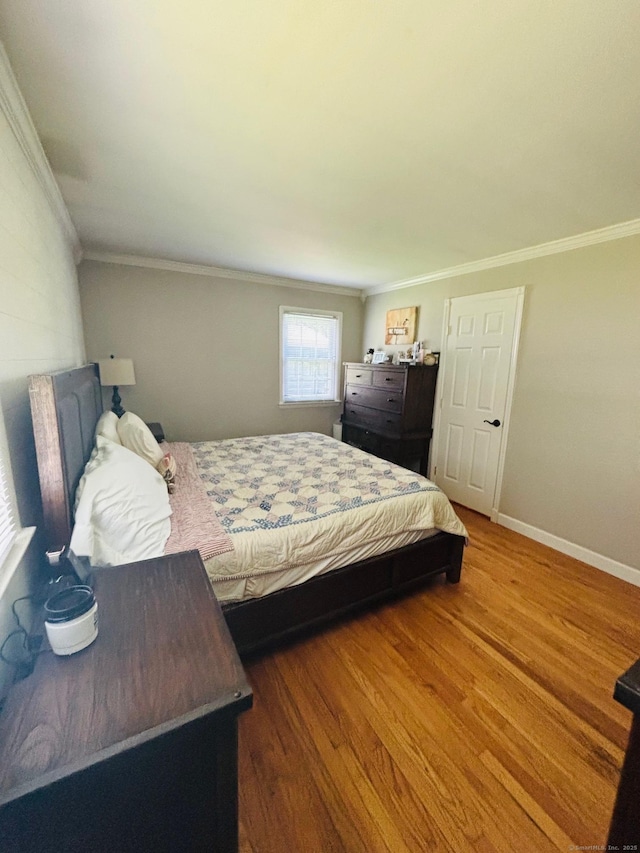 23 Dana Rd, Danbury, CT 06811 - bedroom featuring crown molding, wood finished floors, and baseboards