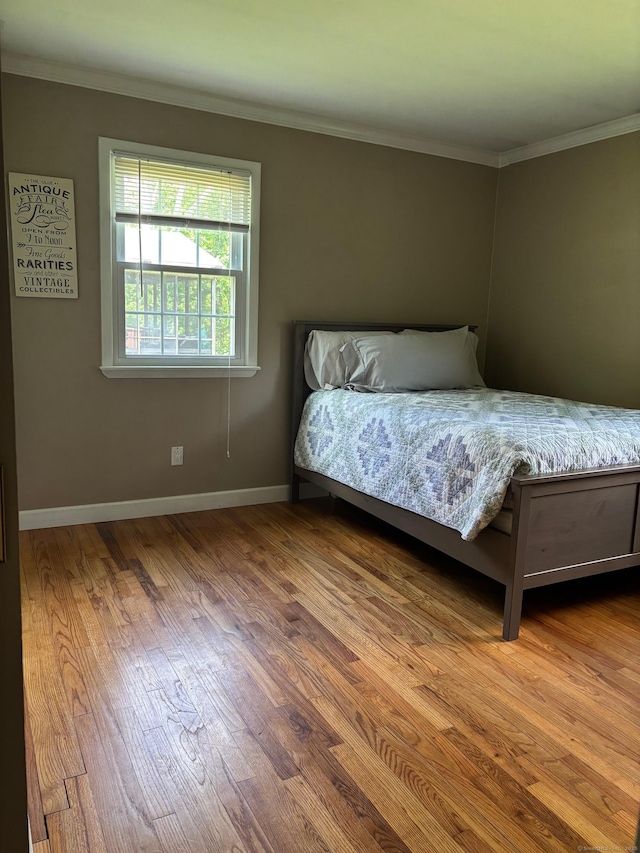 23 Dana Rd, Danbury, CT 06811 - bedroom with ornamental molding, wood finished floors, and baseboards