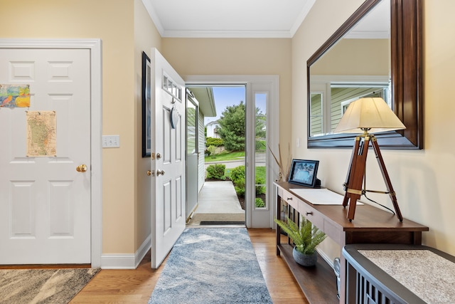91 Pondview Cir Unit 91, Beacon Falls, CT 06403 - entryway with crown molding, light wood-style flooring, and baseboards