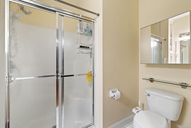 91 Pondview Cir Unit 91, Beacon Falls, CT 06403 - bathroom with baseboards, a stall shower, and toilet