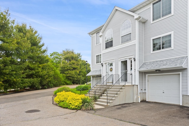 560 Silver Sands Rd Unit 902, East Haven, CT 06512 - view of front of house featuring an attached garage and driveway