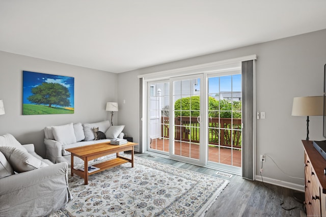 560 Silver Sands Rd Unit 902, East Haven, CT 06512 - living area with baseboards and wood finished floors
