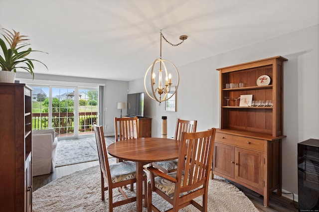 560 Silver Sands Rd Unit 902, East Haven, CT 06512 - dining area with wood finished floors and a chandelier