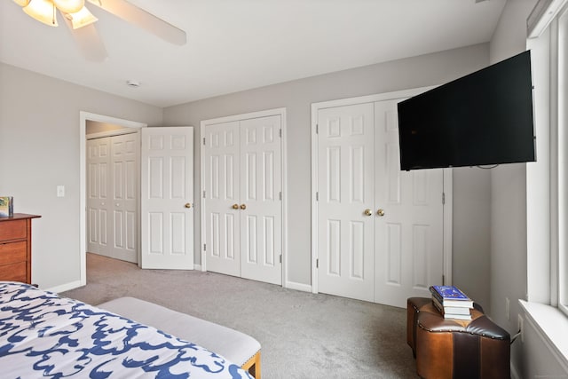 560 Silver Sands Rd Unit 902, East Haven, CT 06512 - carpeted bedroom featuring multiple closets, ceiling fan, and baseboards