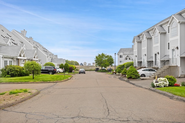 560 Silver Sands Rd Unit 902, East Haven, CT 06512 - view of asphalt street with a residential view and curbs
