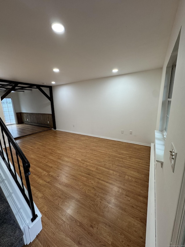 103 Kohanza St Unit E, Danbury, CT 06811 - unfurnished room featuring wood finished floors, recessed lighting, baseboards, and stairway