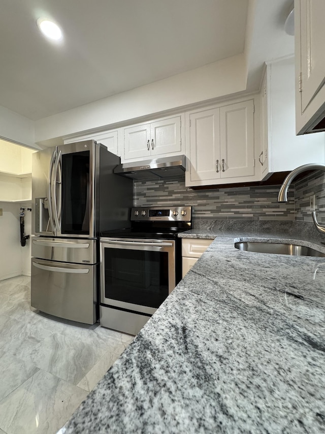 103 Kohanza St Unit E, Danbury, CT 06811 - kitchen with appliances with stainless steel finishes, a sink, under cabinet range hood, and tasteful backsplash