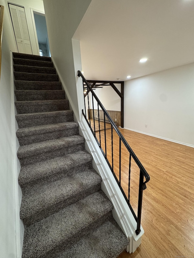 103 Kohanza St Unit E, Danbury, CT 06811 - stairs with wood finished floors, recessed lighting, and baseboards