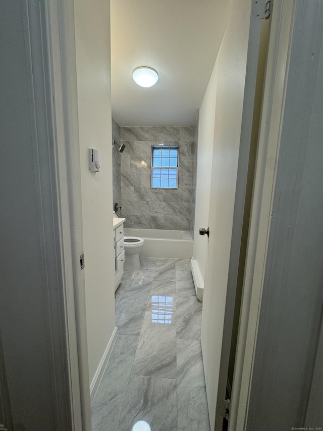 103 Kohanza St Unit E, Danbury, CT 06811 - full bathroom featuring marble finish flooring, vanity, baseboards, toilet, and shower / bathtub combination