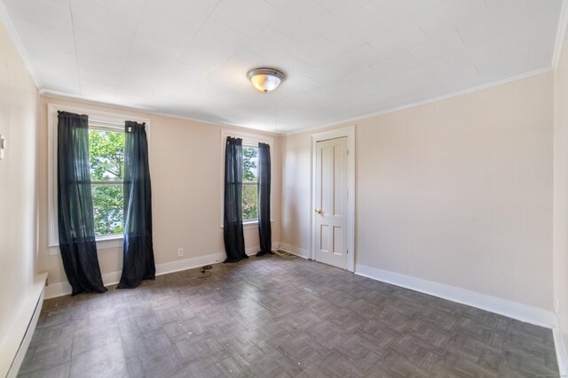 4 Granite St, Waterbury, CT 06706 - spare room featuring baseboards, crown molding, and a baseboard radiator