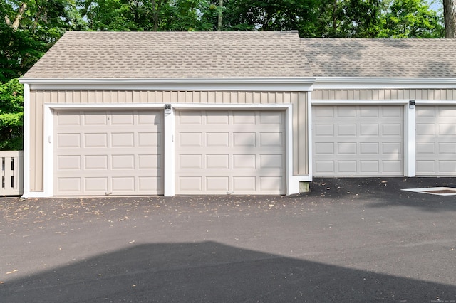 garage with view of wooded area