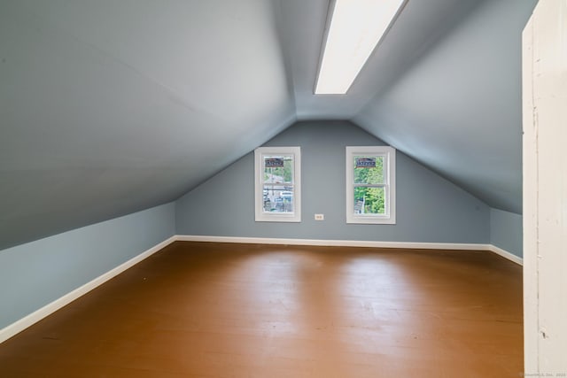 253 N Main St, Norwich, CT 06360 - bonus room featuring wood finished floors, vaulted ceiling, and baseboards