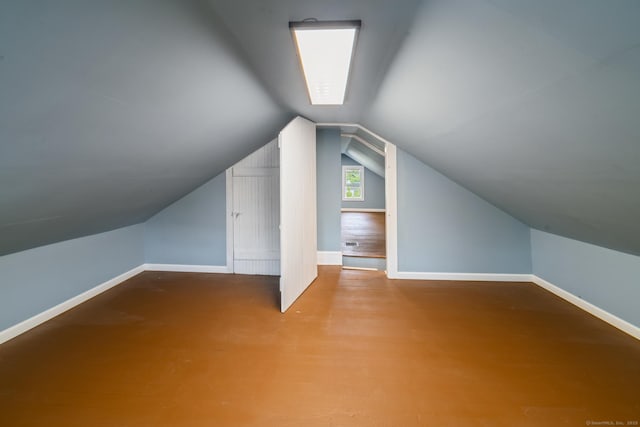 253 N Main St, Norwich, CT 06360 - bonus room with vaulted ceiling, baseboards, and wood finished floors