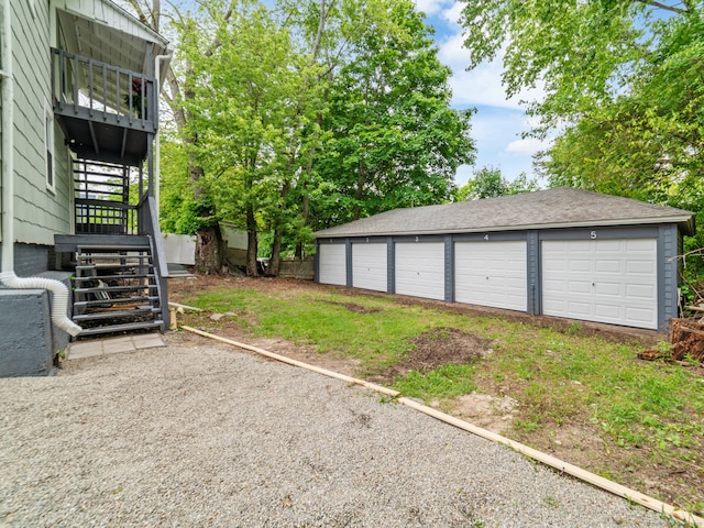 253 N Main St, Norwich, CT 06360 - view of yard featuring stairway, an outdoor structure, and a garage