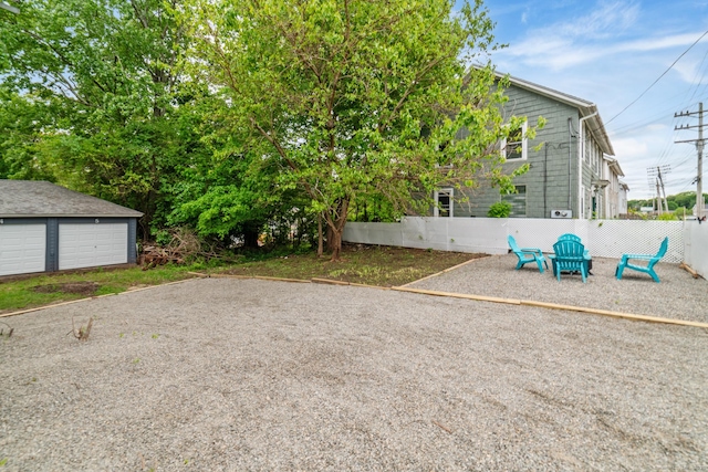253 N Main St, Norwich, CT 06360 - view of yard featuring an outbuilding and a garage