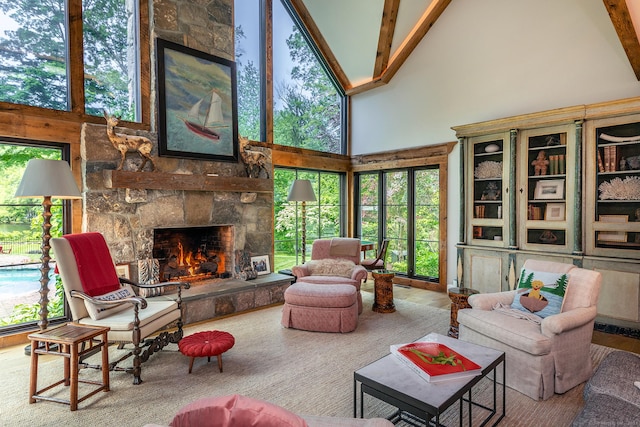 8 Heritage Island Rd, New Fairfield, CT 06812 - living area featuring high vaulted ceiling, a fireplace, and wood finished floors