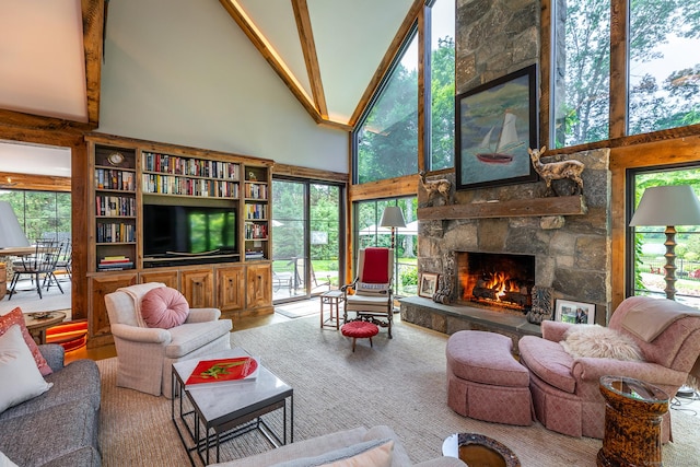 8 Heritage Island Rd, New Fairfield, CT 06812 - living room with high vaulted ceiling, a fireplace, and wood finished floors