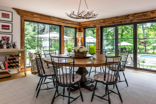 8 Heritage Island Rd, New Fairfield, CT 06812 - dining space with plenty of natural light, a chandelier, and light wood-type flooring