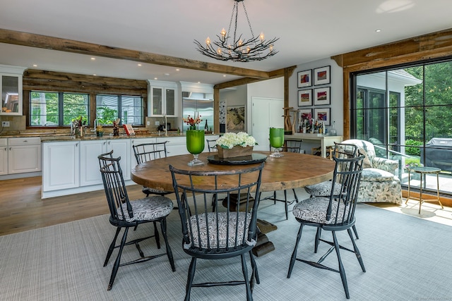 8 Heritage Island Rd, New Fairfield, CT 06812 - dining space featuring light wood-style flooring, healthy amount of natural light, a chandelier, beamed ceiling, and recessed lighting