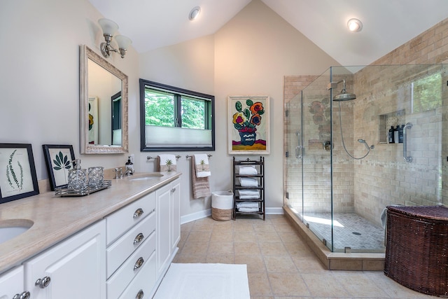 8 Heritage Island Rd, New Fairfield, CT 06812 - full bathroom featuring double vanity, a stall shower, baseboards, tile patterned flooring, and high vaulted ceiling