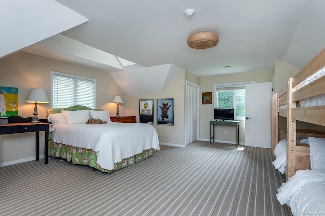 8 Heritage Island Rd, New Fairfield, CT 06812 - bedroom with carpet flooring, baseboards, lofted ceiling, and a closet