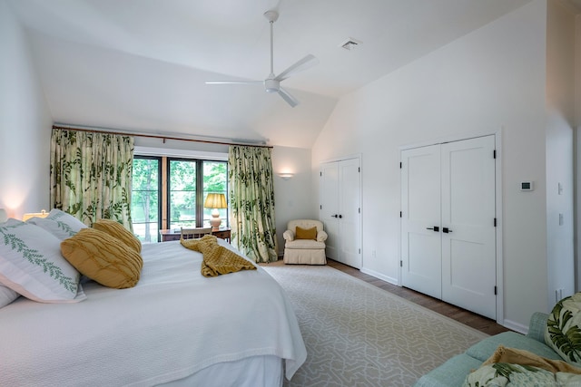 8 Heritage Island Rd, New Fairfield, CT 06812 - bedroom with two closets, wood finished floors, a ceiling fan, baseboards, and high vaulted ceiling
