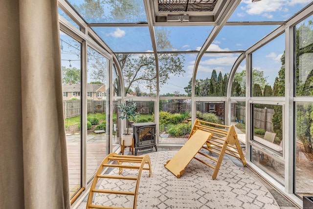 239 Bellevue Ave, West Haven, CT 06516 - sunroom with a wood stove