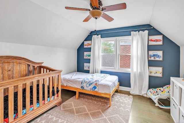 239 Bellevue Ave, West Haven, CT 06516 - bedroom featuring vaulted ceiling, wood finished floors, a ceiling fan, and baseboards