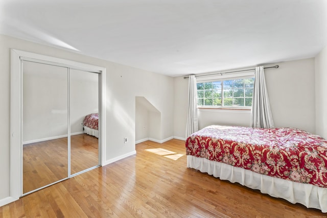 18 Glover Ave, Newtown, CT 06470 - bedroom with wood finished floors and a closet