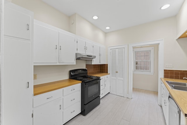 18 Glover Ave, Newtown, CT 06470 - kitchen with black electric range, under cabinet range hood, dishwasher, tasteful backsplash, and light countertops