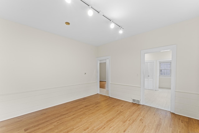 18 Glover Ave, Newtown, CT 06470 - spare room with track lighting and light wood-style floors