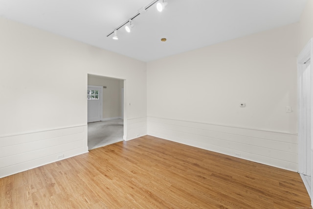 18 Glover Ave, Newtown, CT 06470 - unfurnished room with rail lighting and light wood finished floors