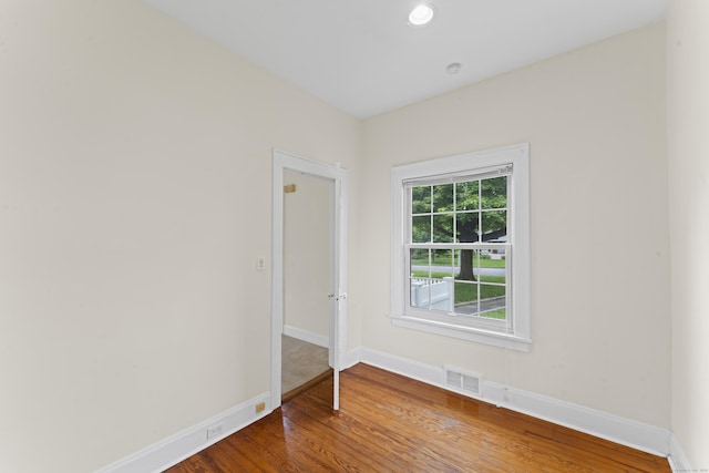 18 Glover Ave, Newtown, CT 06470 - empty room with wood finished floors and recessed lighting