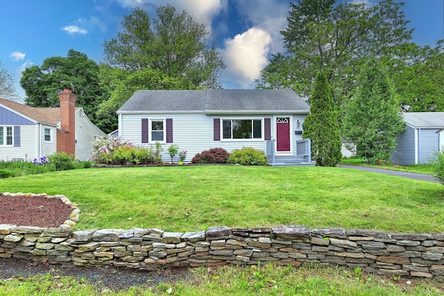 view of front of house with a front lawn