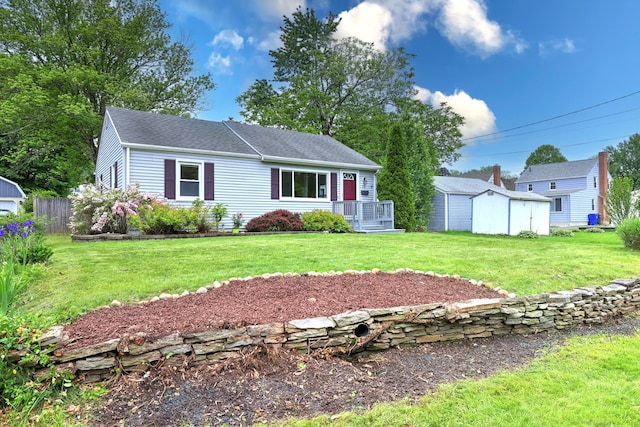 ranch-style home with roof with shingles