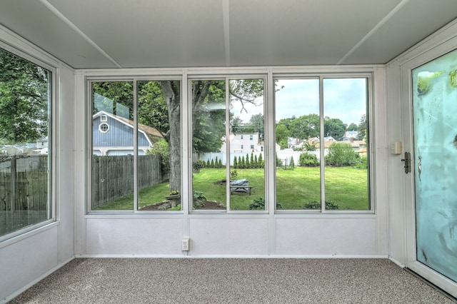 unfurnished sunroom featuring plenty of natural light