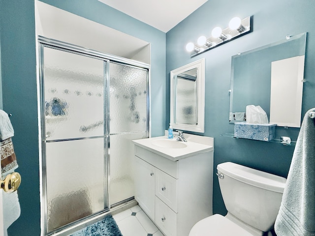 1 Strawberry Hill Ct Apt 1A, Stamford, CT 06902 - bathroom with a shower stall, toilet, vanity, and tile patterned flooring