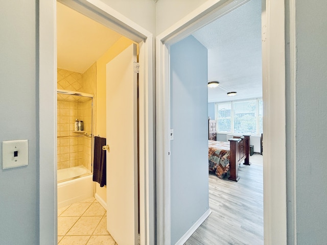 1 Strawberry Hill Ct Apt 1A, Stamford, CT 06902 - hallway featuring baseboards