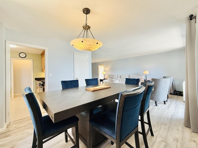 1 Strawberry Hill Ct Apt 1A, Stamford, CT 06902 - dining space featuring light wood-style flooring