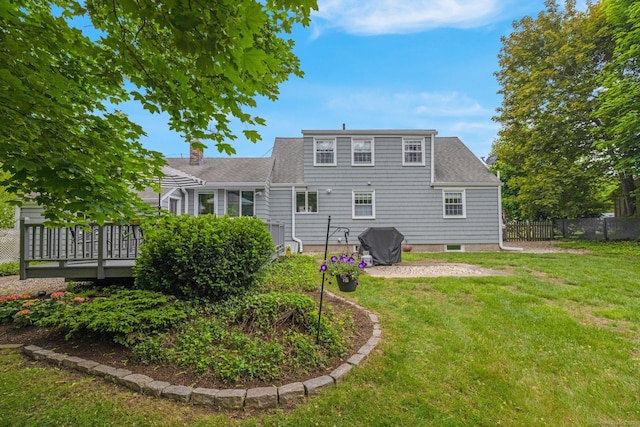 10 Knollwood Rd, Farmington, CT 06032 - rear view of property featuring a chimney, a wooden deck, a patio, and roof with shingles