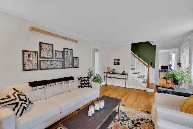 10 Knollwood Rd, Farmington, CT 06032 - living area with stairway, wood finished floors, and crown molding