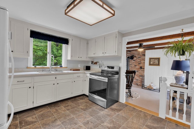 10 Knollwood Rd, Farmington, CT 06032 - kitchen with stainless steel electric range oven, a sink, white fridge, white cabinets, and beamed ceiling